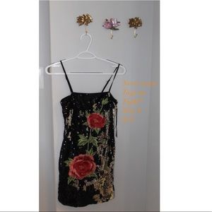 Beautiful sequin dress with rose detail